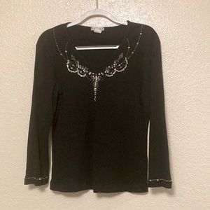 Beautiful black longsleeves has beads. Hannah size large